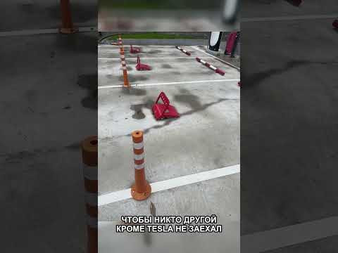 Как Tesla защищает места у Supercharger Как Tesla защищает места у Supercharger